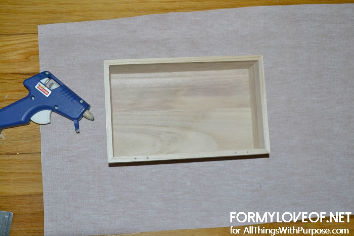 hot glue box onto center of pre cut lather like fabric