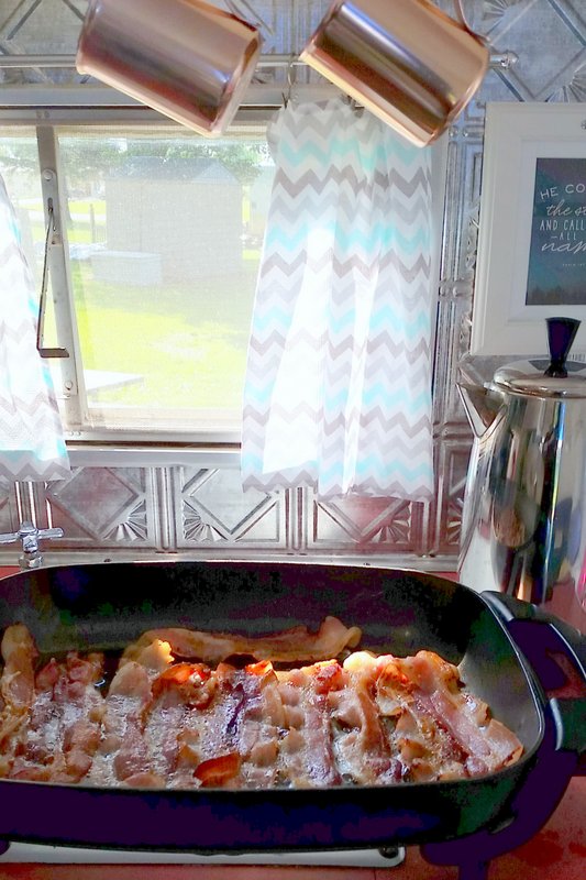 cooking in a vintage camper