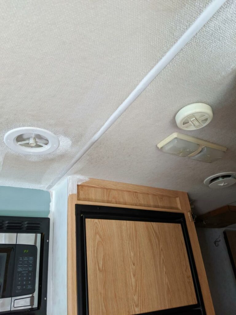 Painting a Stained, Grungy Carpeted Ceiling in an Old RV