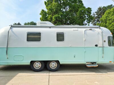 Airstream Argosy Travel Trailer Renovation Exterior Paint Update All Things with Purpose Sarah Lemp 3