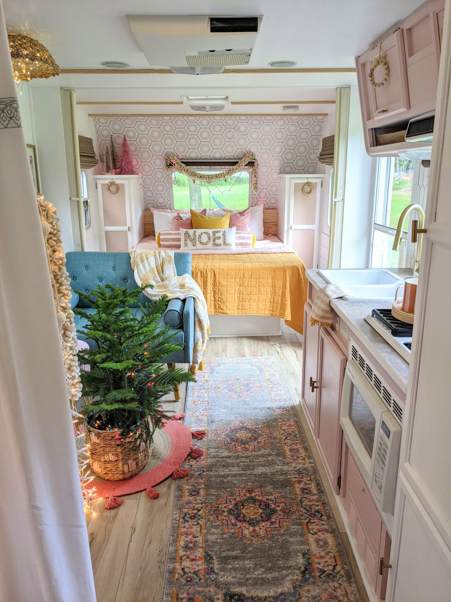 Colorful and Fun Christmas Decorations in the Renovated Camper All Things with Purpose Sarah Lemp 1
