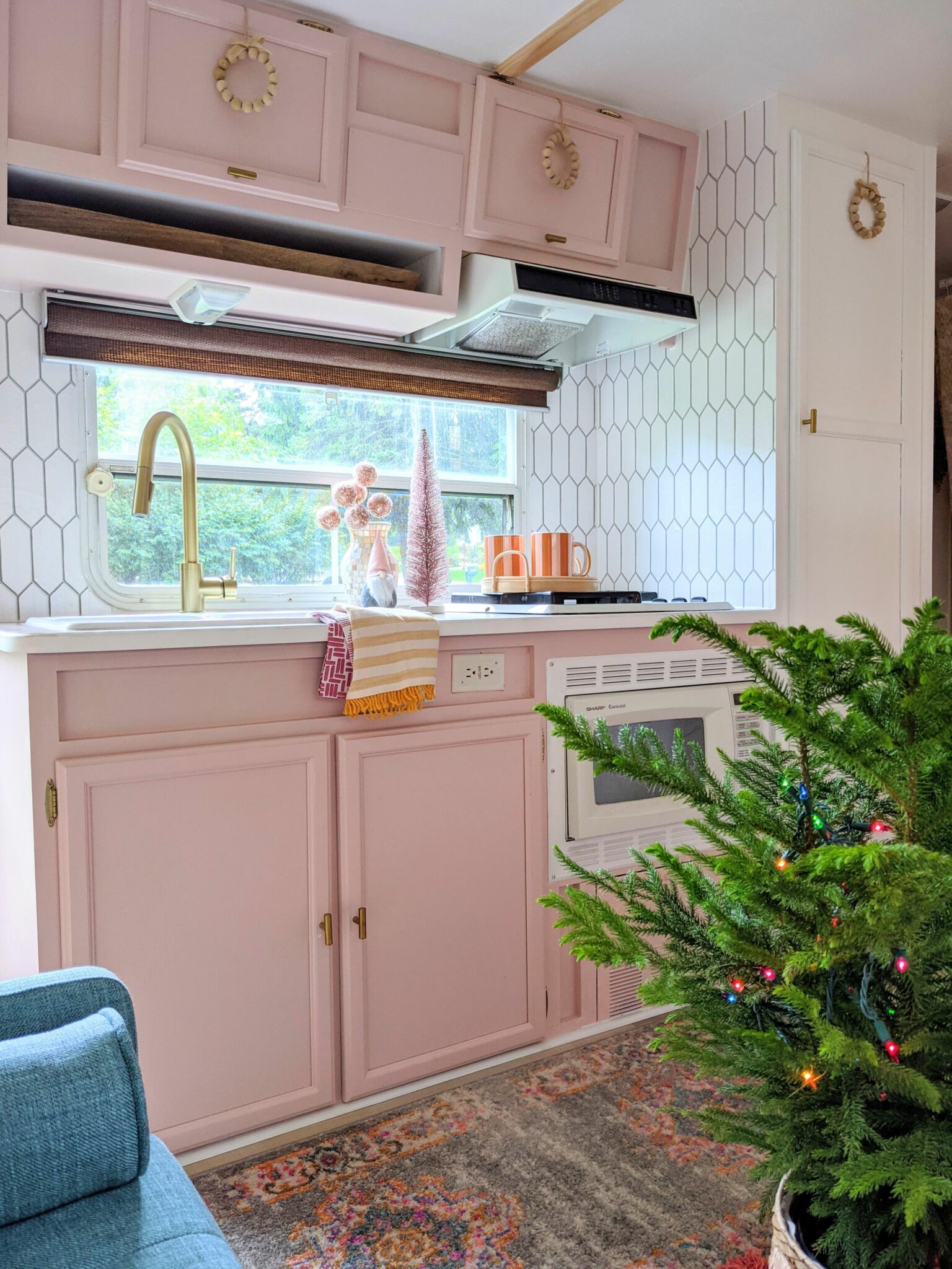 Colorful and Fun Christmas Decorations in the Renovated Camper All Things with Purpose Sarah Lemp 5